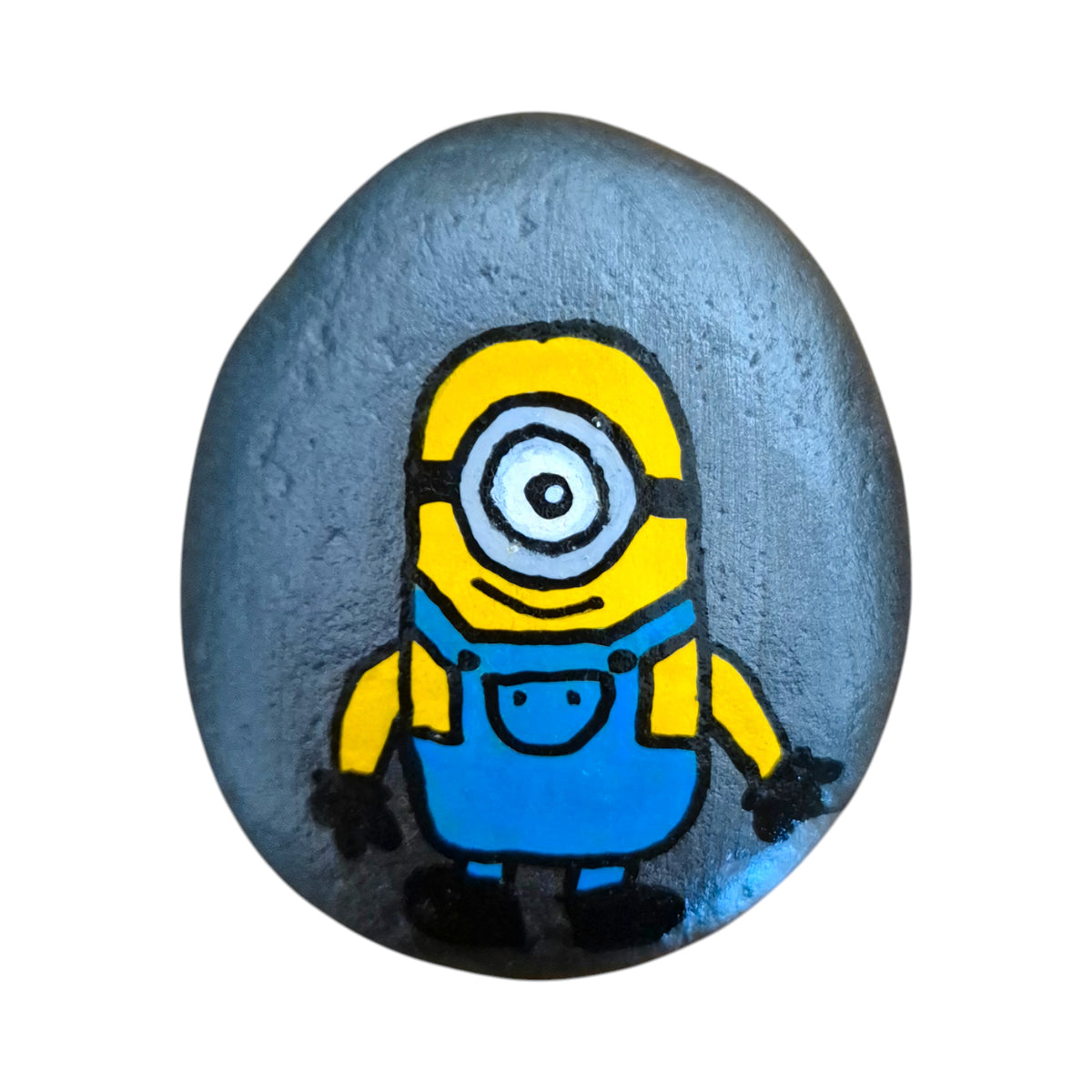 Hand painted one-eyed yellow helper character on a natural stone rock