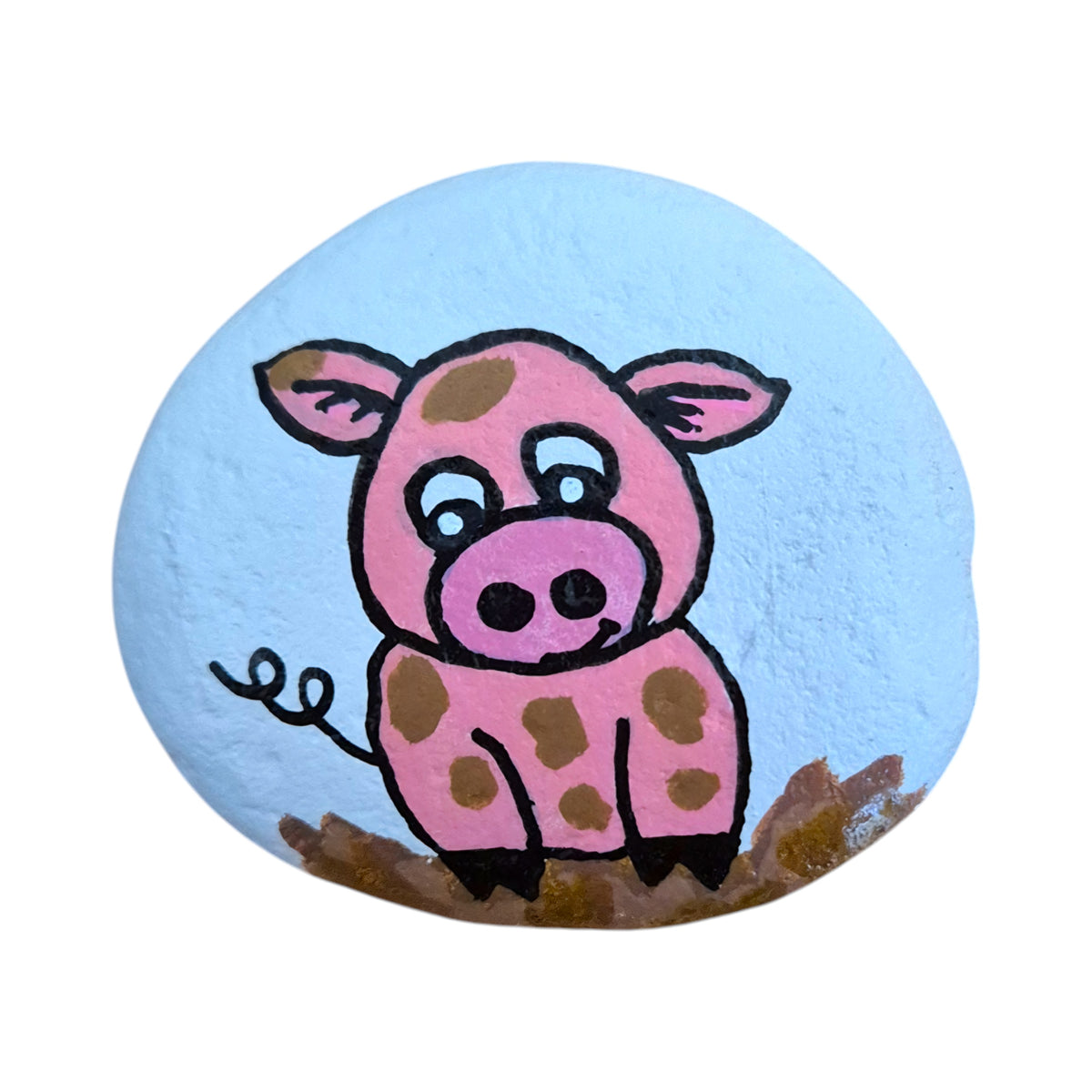 Hand painted pink pig rolling in the mud on a natural stone rock