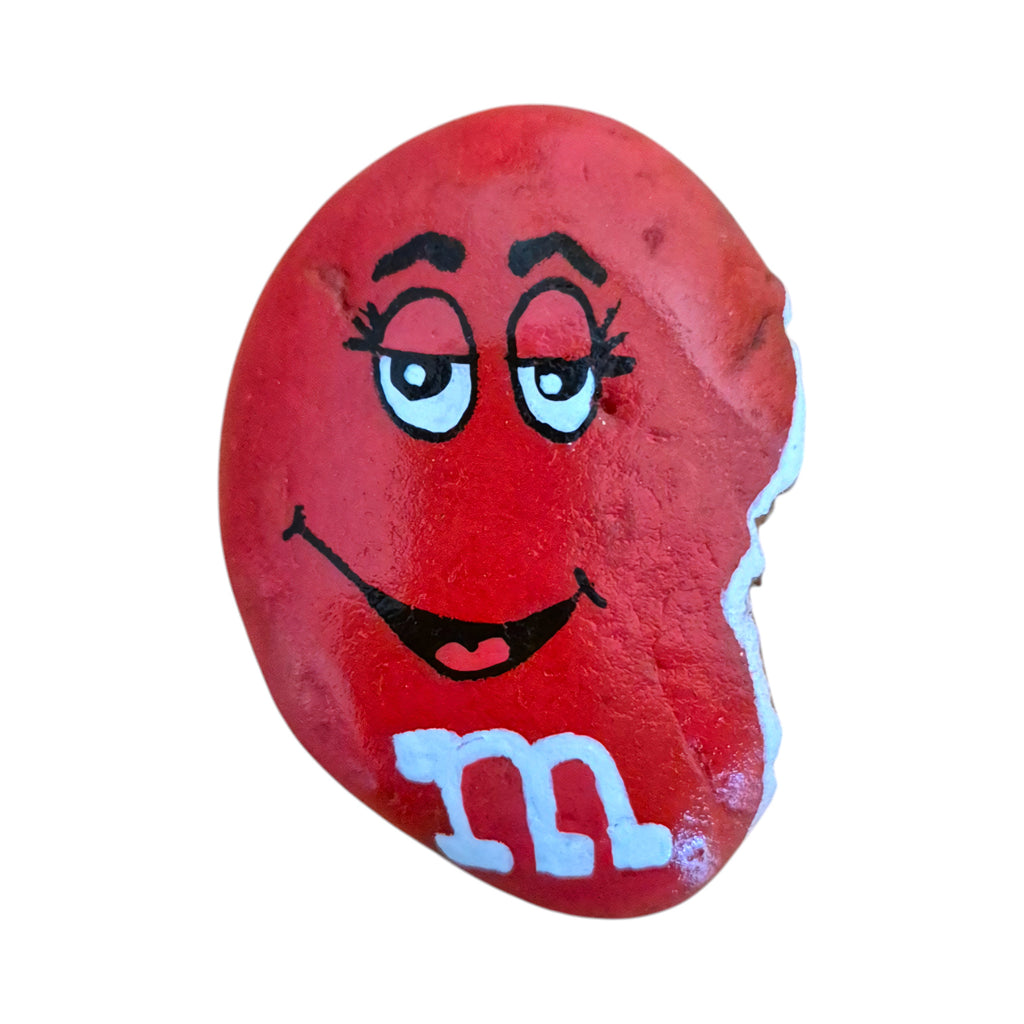 Hand painted half-eaten red candy rock on natural stone