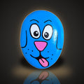 Blep the Blue Pup, a hand painted blue dog rock with its tongue out, on a black and gold background