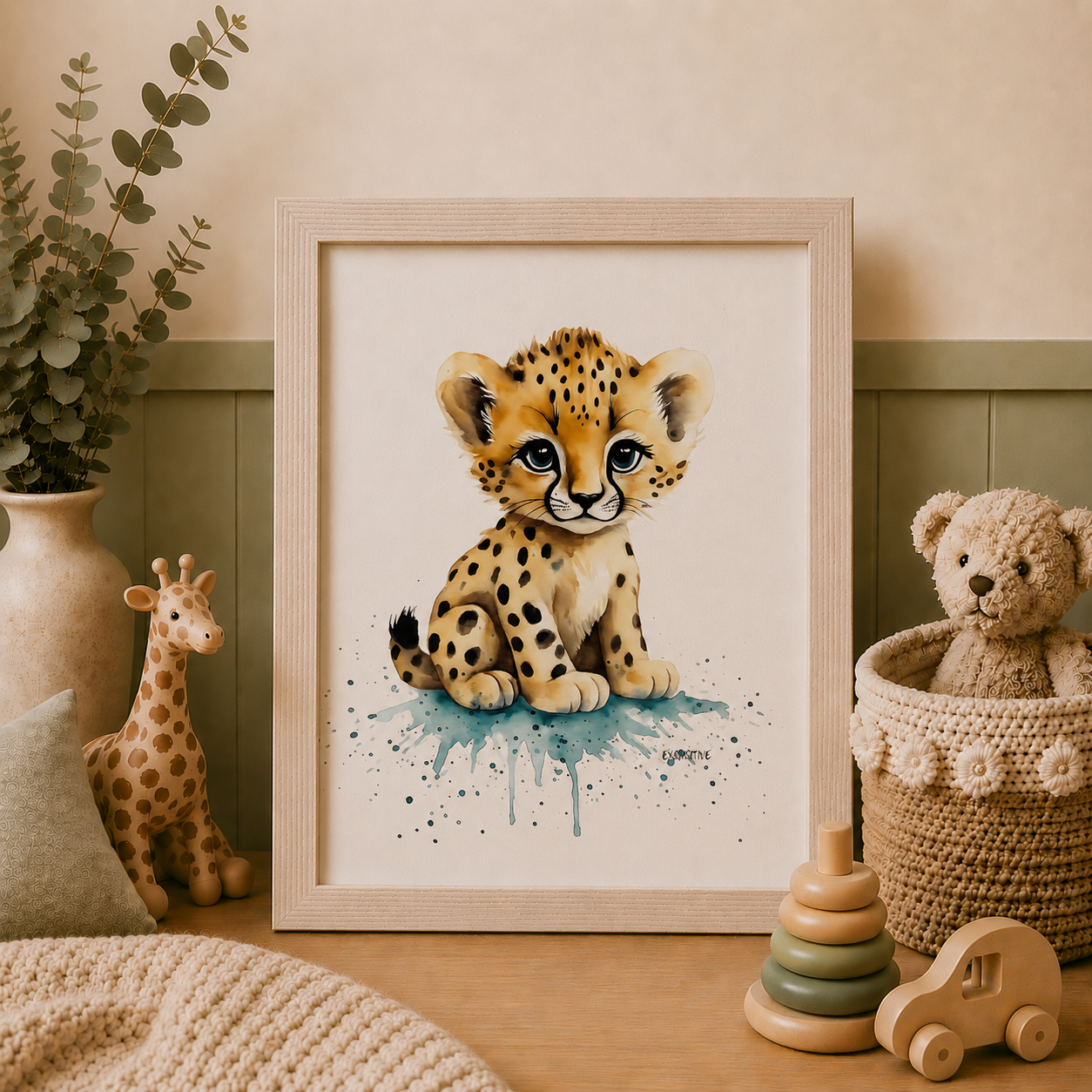 Framed artwork of a leopard cub in a child's room with toys and decor.