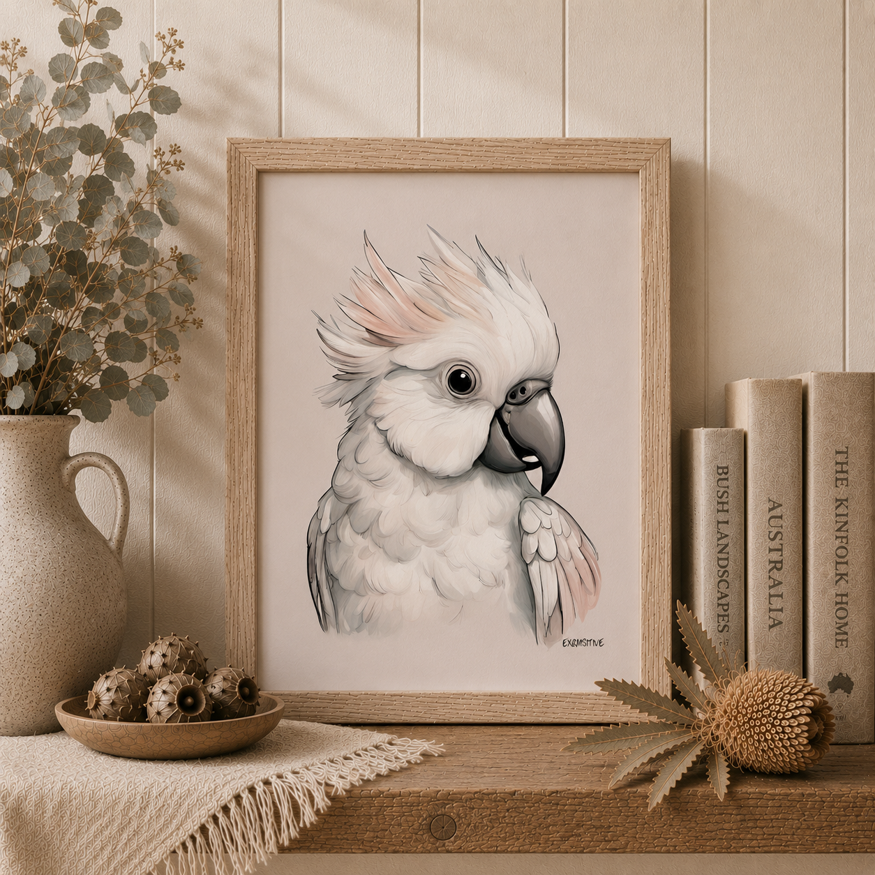 Framed artwork of a cockatoo on a shelf with decorative items.