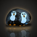 The Chip Thieves, a hand painted two seagulls rock on black stone, on a black and gold background